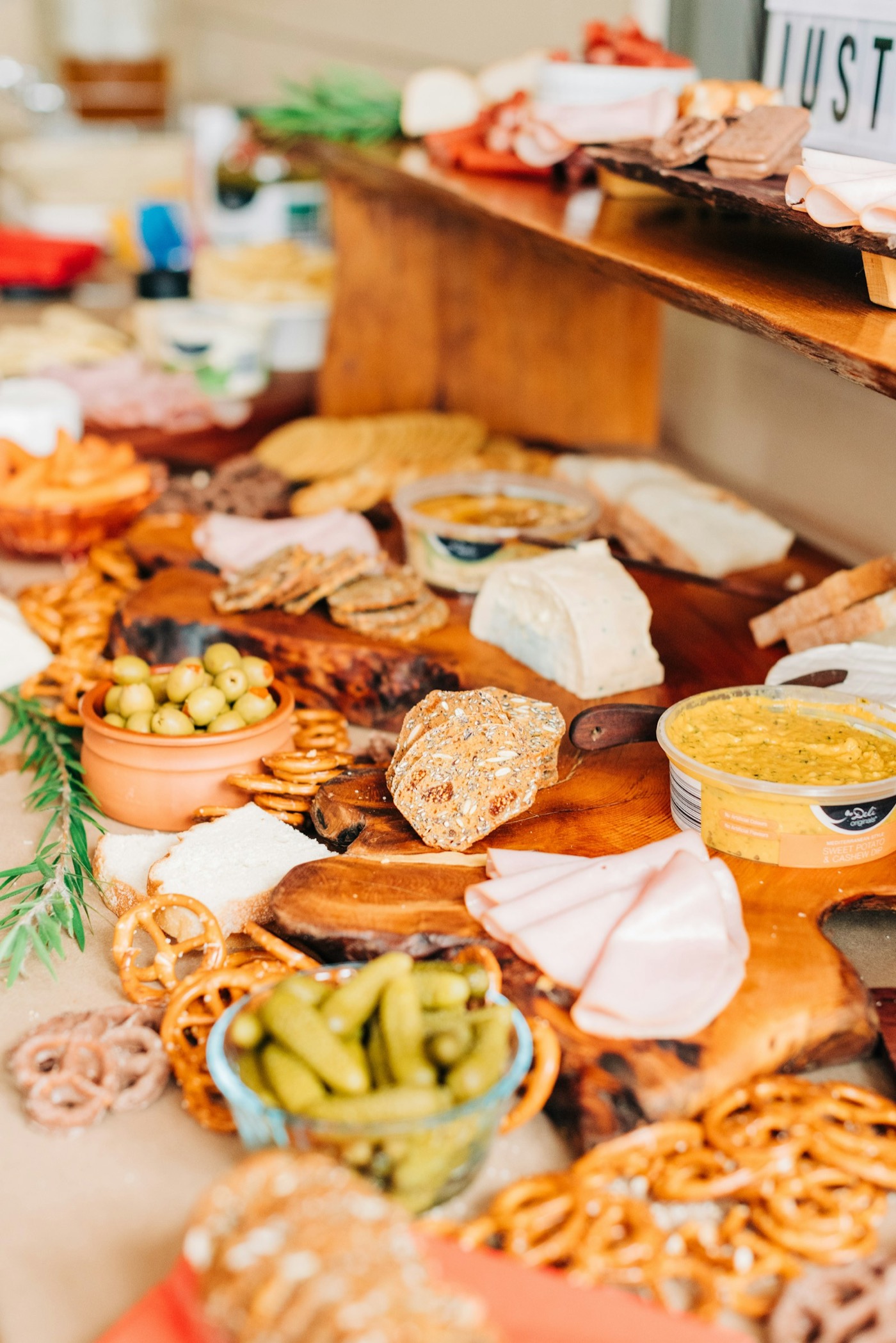 A custom-themed charcuterie spread with seasonal florals.